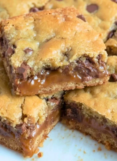 Homemade Knock You Naked Bars with layers of chocolate and caramel