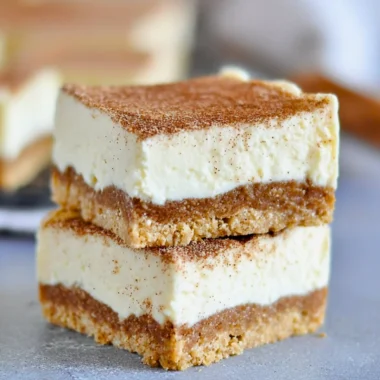 No Bake Keto Churro Cheesecake Bars with a cinnamon topping