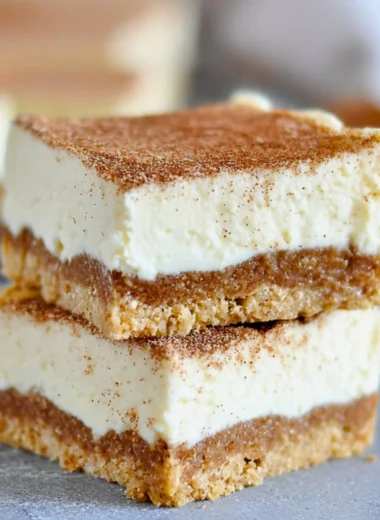 No Bake Keto Churro Cheesecake Bars with a cinnamon topping