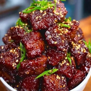 Sweet and sticky steak bites recipe served as an appetizer.