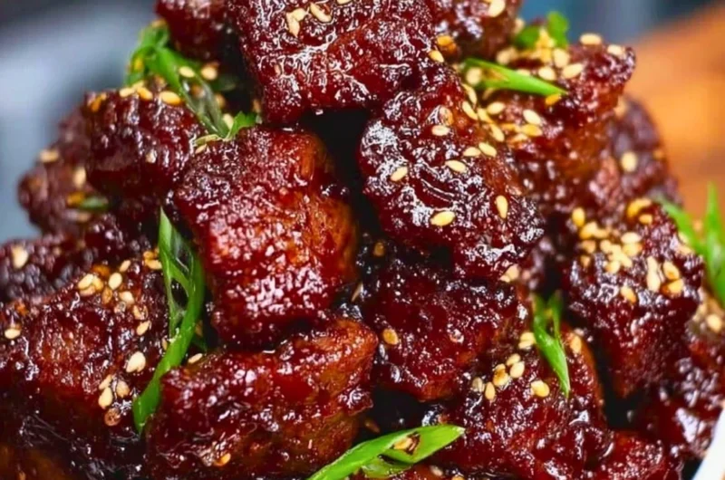 Sweet and sticky steak bites recipe served as an appetizer.