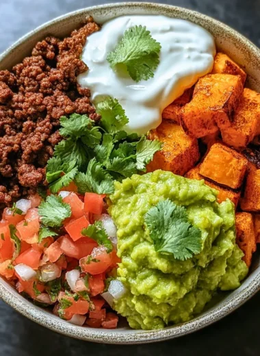 Colorful Sweet Potato Taco Bowl with fresh toppings and vibrant ingredients