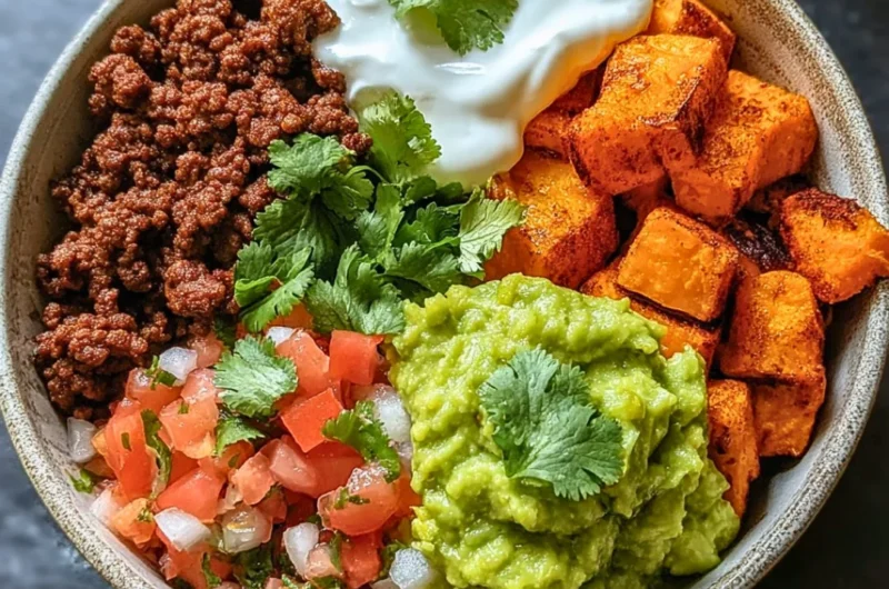 Colorful Sweet Potato Taco Bowl with fresh toppings and vibrant ingredients