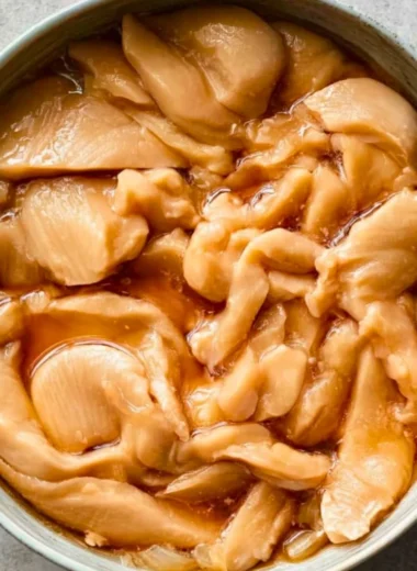 Velveting chicken technique for tender, flavorful Asian dishes