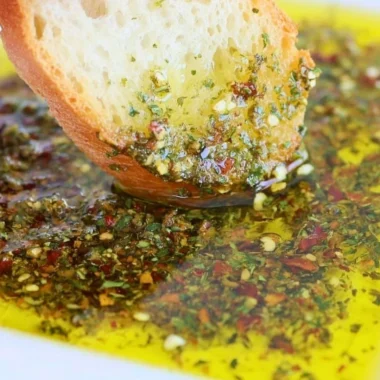Carrabba's style bread dipping oil served with fresh bread.