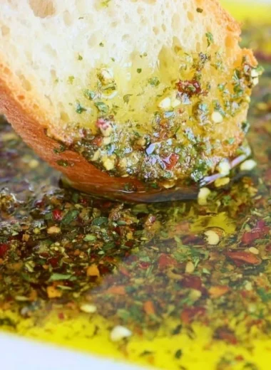 Carrabba's style bread dipping oil served with fresh bread.