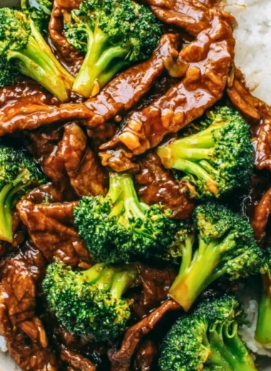 Stir-fried Chinese Beef and Broccoli with vibrant greens and tender beef slices.