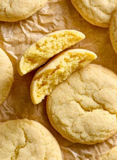 Freshly baked classic sugar cookies on a cooling rack