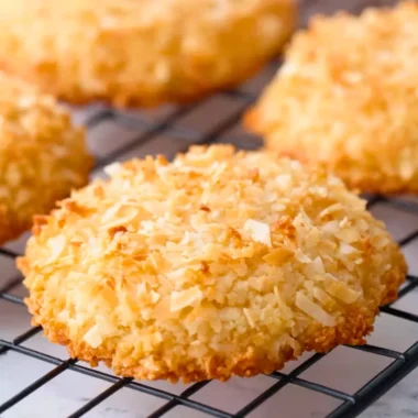 Delicious homemade coconut cookies on a cooling rack