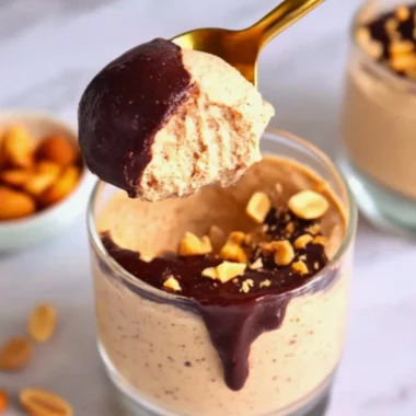 Cottage Cheese Peanut Butter Mousse served in a bowl with a spoon