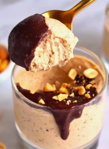 Cottage Cheese Peanut Butter Mousse served in a bowl with a spoon