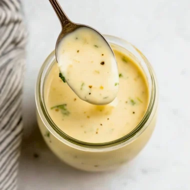Creamy Garlic Parmesan Sauce served in a bowl, ideal for pasta dishes.