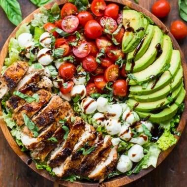 Healthy Chicken Avocado Caprese Salad with fresh ingredients