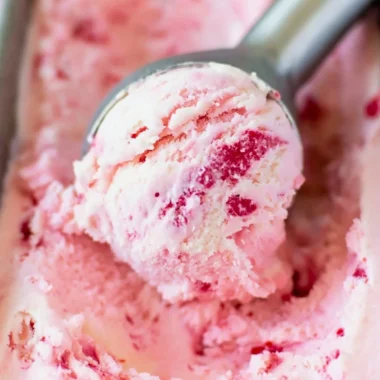 Bowl of creamy homemade ice cream with colorful toppings