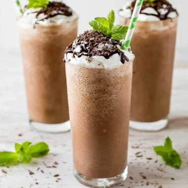 McDonald's Mocha Frappe with whipped cream and chocolate drizzle