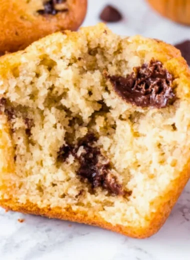 Delicious homemade peanut butter muffins with a soft and fluffy texture.