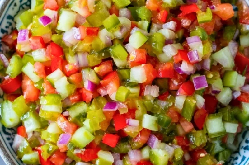 Bowl of fresh Pickle de Gallo with colorful vegetables and herbs