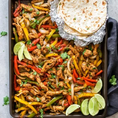 Delicious sheet pan chicken fajitas with colorful peppers and onions.