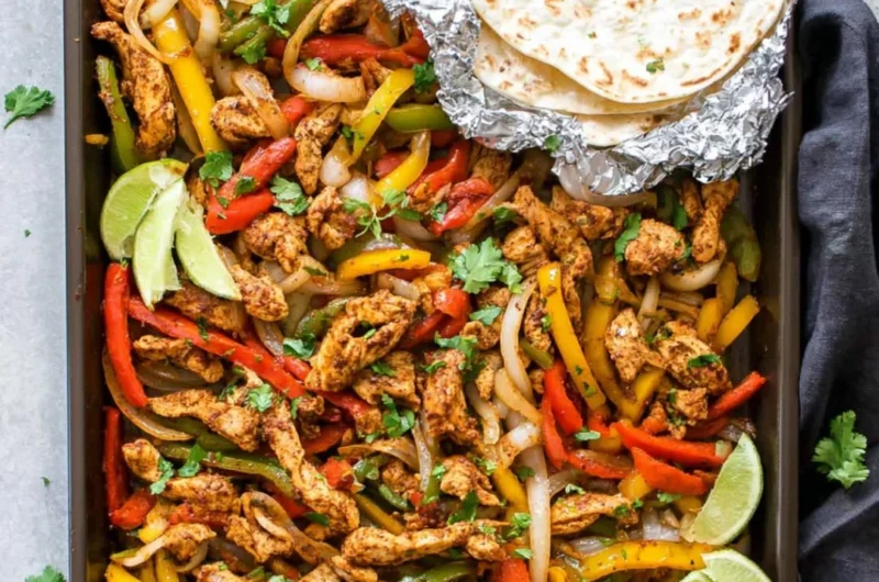 Delicious sheet pan chicken fajitas with colorful peppers and onions.