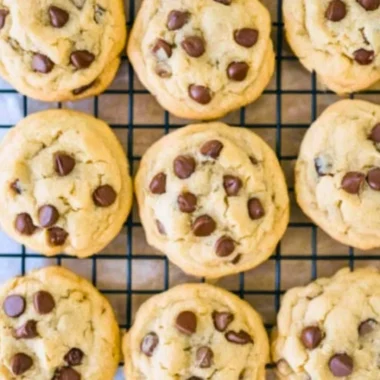 Soft batch chocolate chip cookies on a cooling rack
