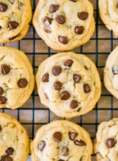 Soft batch chocolate chip cookies on a cooling rack