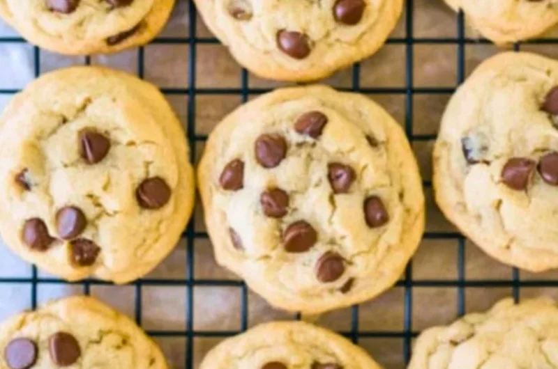 Soft batch chocolate chip cookies on a cooling rack