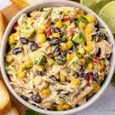 A colorful Southwest Chicken Salad with grilled chicken, avocado, and vegetables.