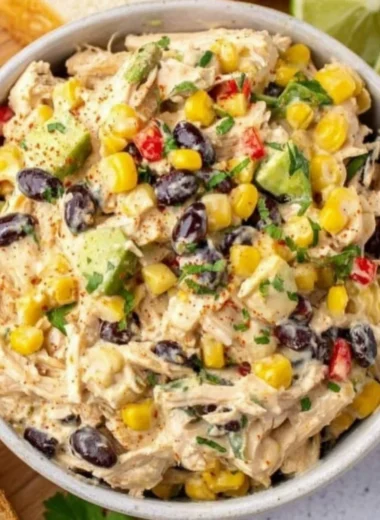 A colorful Southwest Chicken Salad with grilled chicken, avocado, and vegetables.