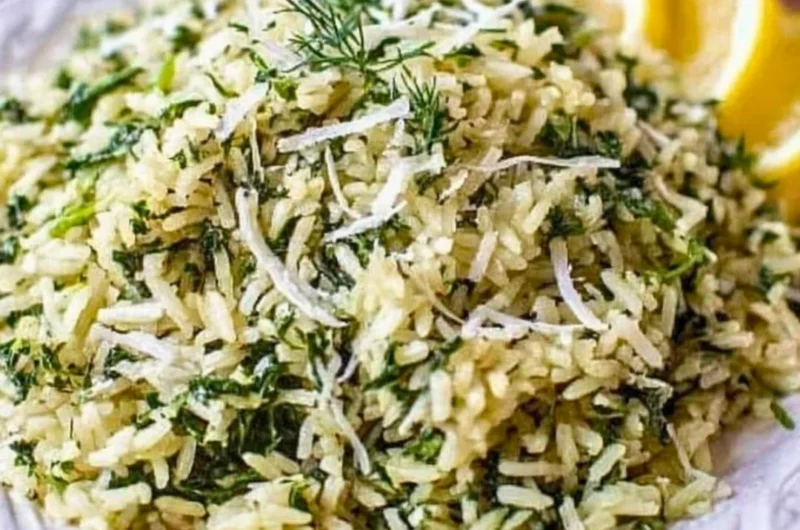 Bowl of spinach rice with fresh spinach and rice grains