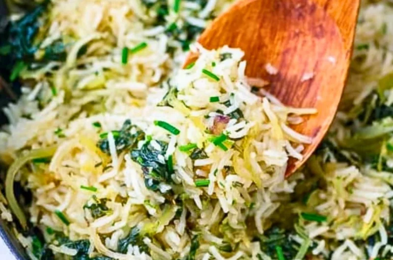 Bowl of nutritious spinach rice garnished with herbs