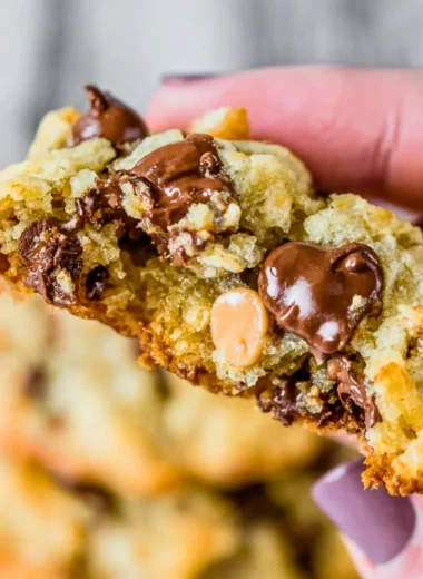 Delicious Texas Cowboy Cookies with oats, chocolate chips, and nuts on a plate.