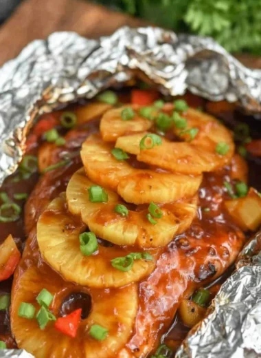 Foil Packet Hawaiian BBQ Chicken served with fresh vegetables and barbecue sauce