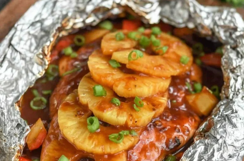 Foil Packet Hawaiian BBQ Chicken served with fresh vegetables and barbecue sauce