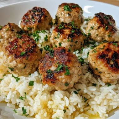 Greek Turkey Meatballs served with Lemon Herb Rice in a bowl