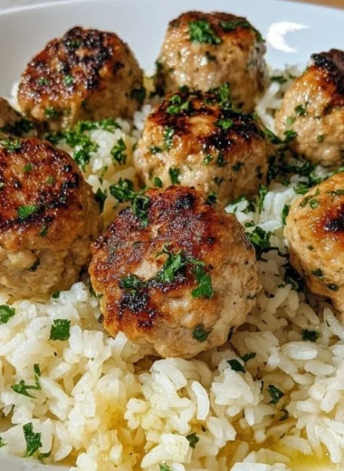 Greek Turkey Meatballs served with Lemon Herb Rice in a bowl