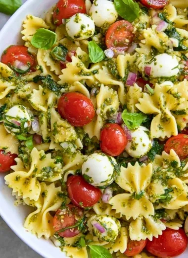 Colorful Italian Bow Tie Pasta Salad with vegetables and dressing