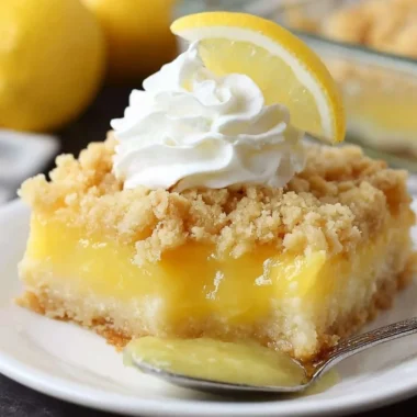 Delicious Lemon Cream Cheese Dump Cake served in a baking dish