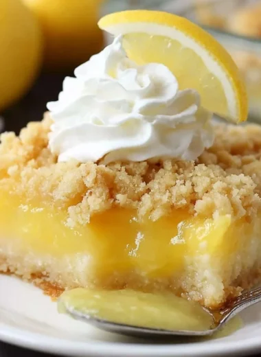 Delicious Lemon Cream Cheese Dump Cake served in a baking dish
