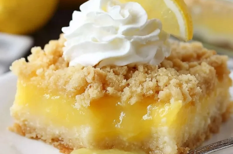 Delicious Lemon Cream Cheese Dump Cake served in a baking dish