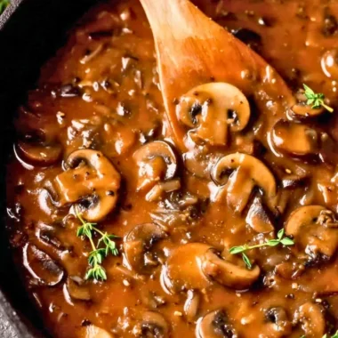 Delicious homemade mushroom gravy served over mashed potatoes