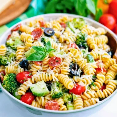 Colorful easy pasta salad with vegetables and Italian dressing in a bowl
