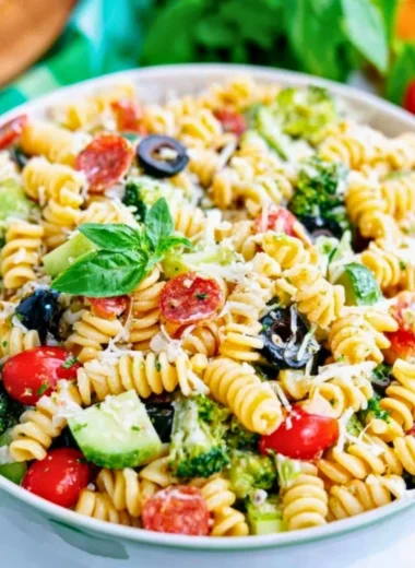 Colorful easy pasta salad with vegetables and Italian dressing in a bowl