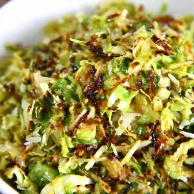 Fresh sautéed shredded brussels sprouts topped with parmesan cheese