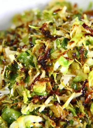 Fresh sautéed shredded brussels sprouts topped with parmesan cheese
