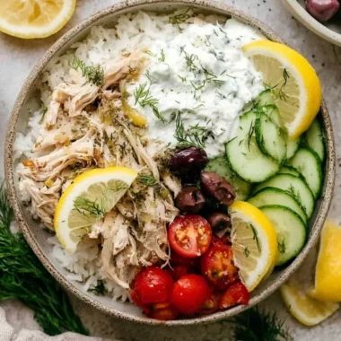 Delicious Slow Cooker Greek Chicken garnished with herbs and olives
