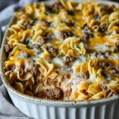 Sour cream beef noodle casserole served in a baking dish