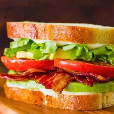 Ultimate BLT sandwich with crispy bacon, fresh lettuce, and ripe tomatoes.