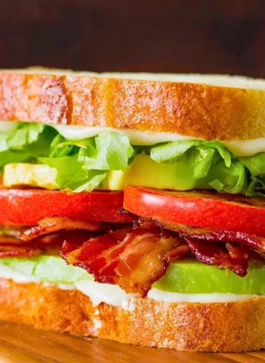 Ultimate BLT sandwich with crispy bacon, fresh lettuce, and ripe tomatoes.
