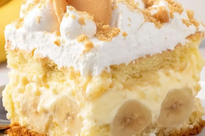 Delicious banana pudding cake layered with creamy banana pudding and whipped cream