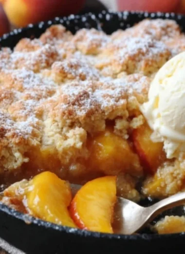 Delicious classic Southern peach cobbler with juicy peaches and golden crust.